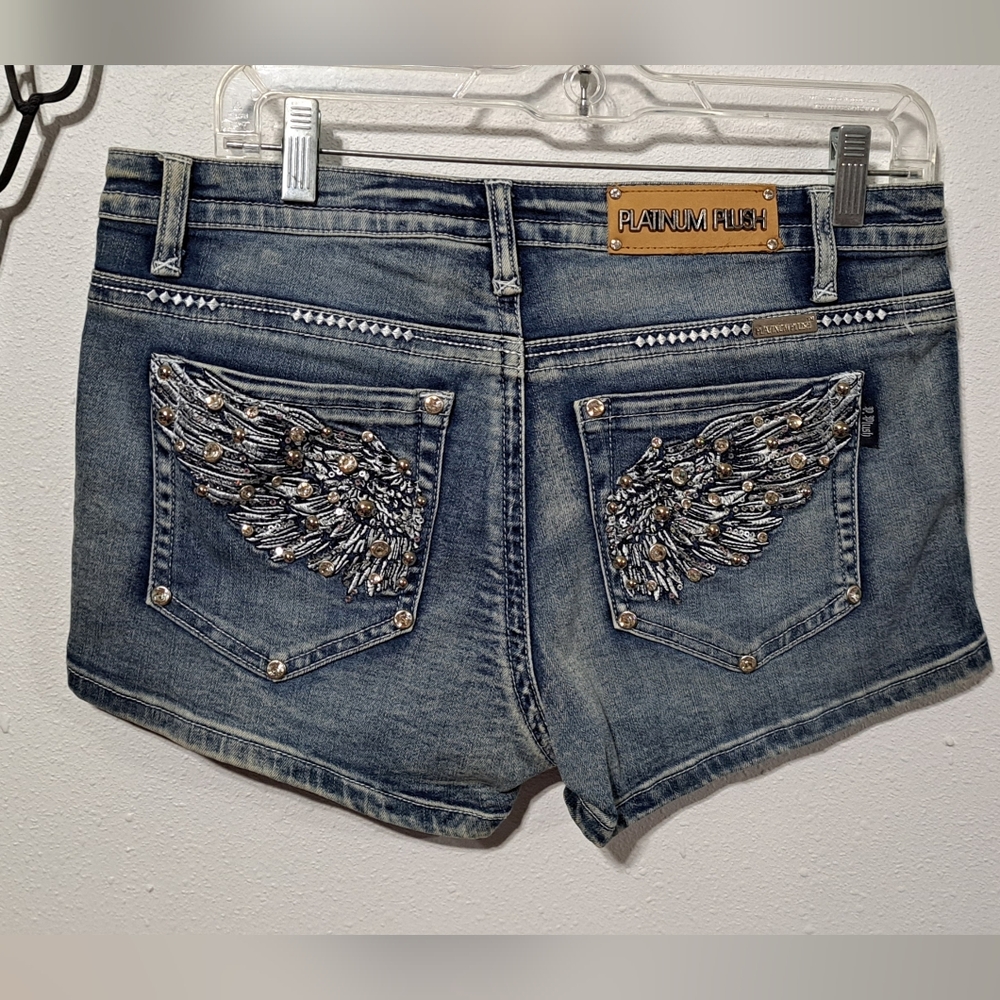 Platinum Plush Denim Shorts with Wing Embroidery NWT.